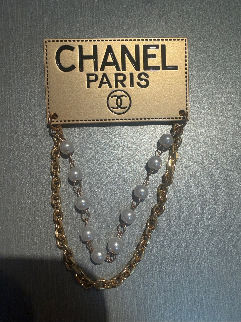 Inspired Gold-Tone Chain and White Pearl Double-Strand Brooch